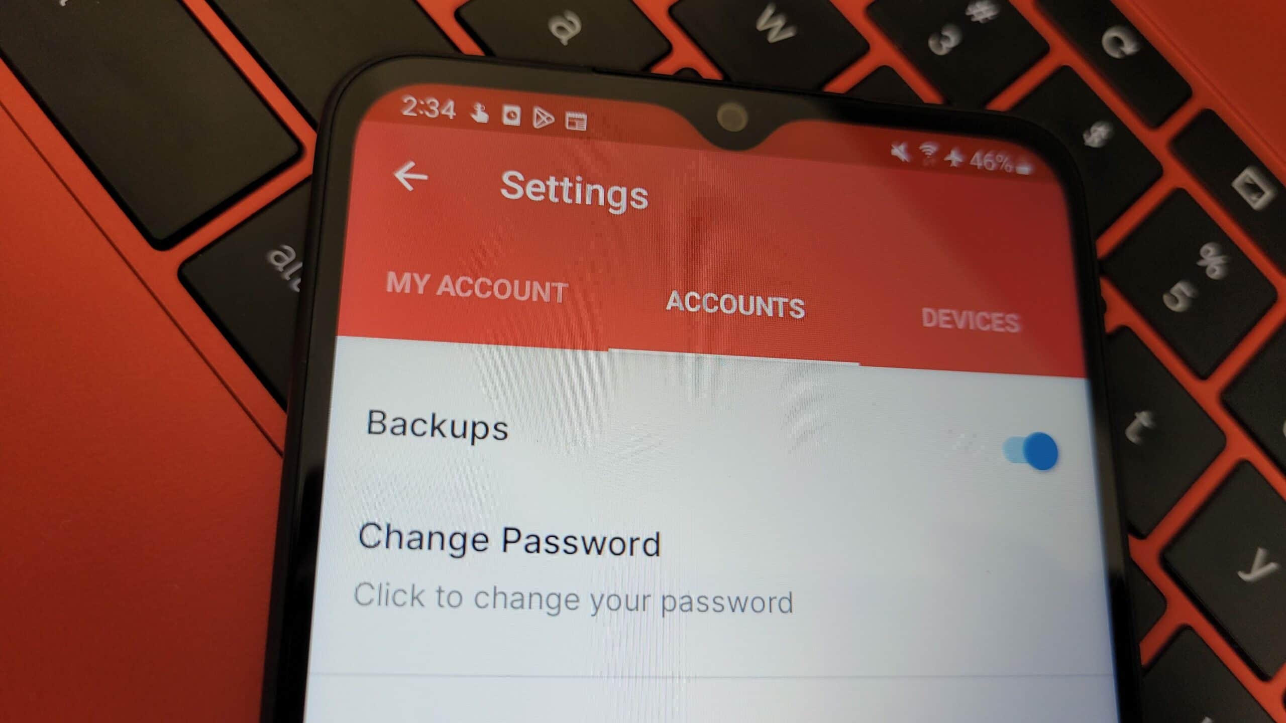 The "Accounts" tab of the Authy app. Backups are enabled and there is the option to change the password.