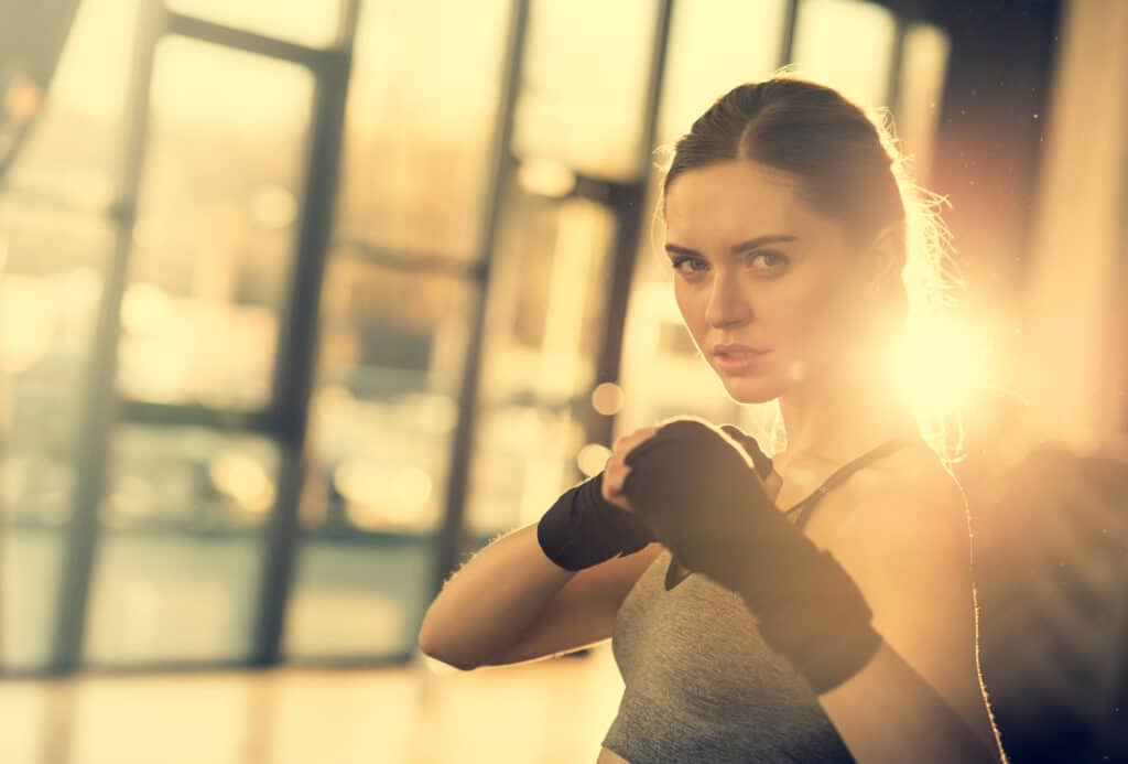 A woman boxer, ready to fight.
